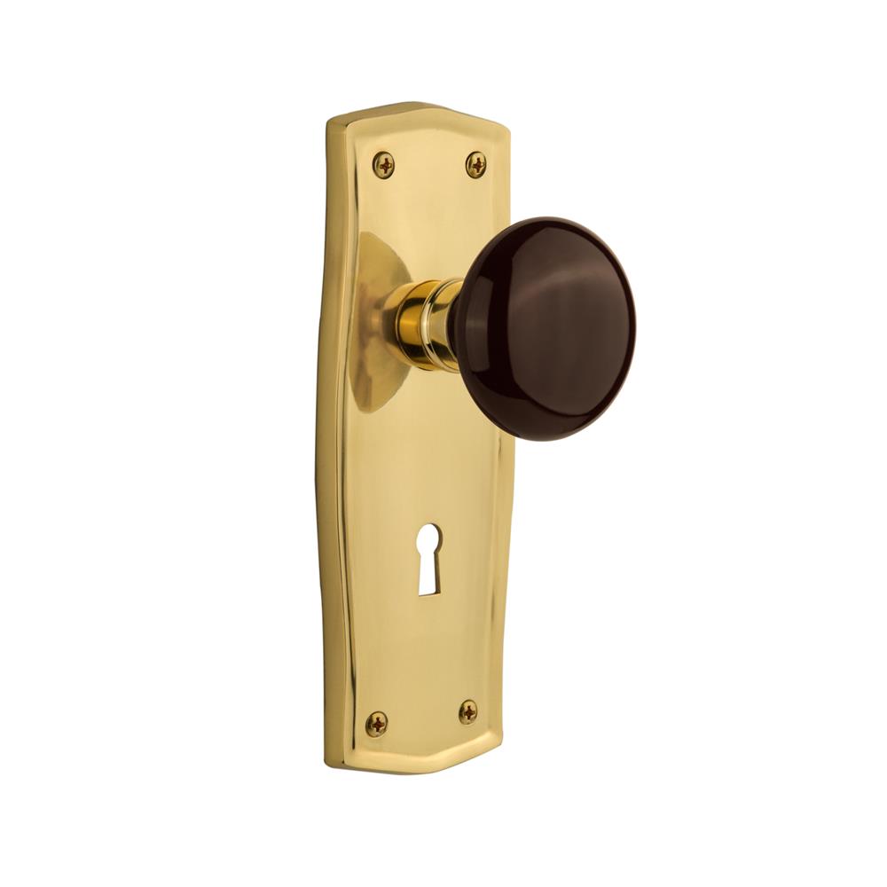 Nostalgic Warehouse PRABRN Mortise Prairie Plate with Brown Porcelain Knob with Keyhole in Polished Brass